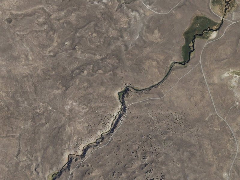 Aerial view of the ground around Hot Creek Gorge Springs