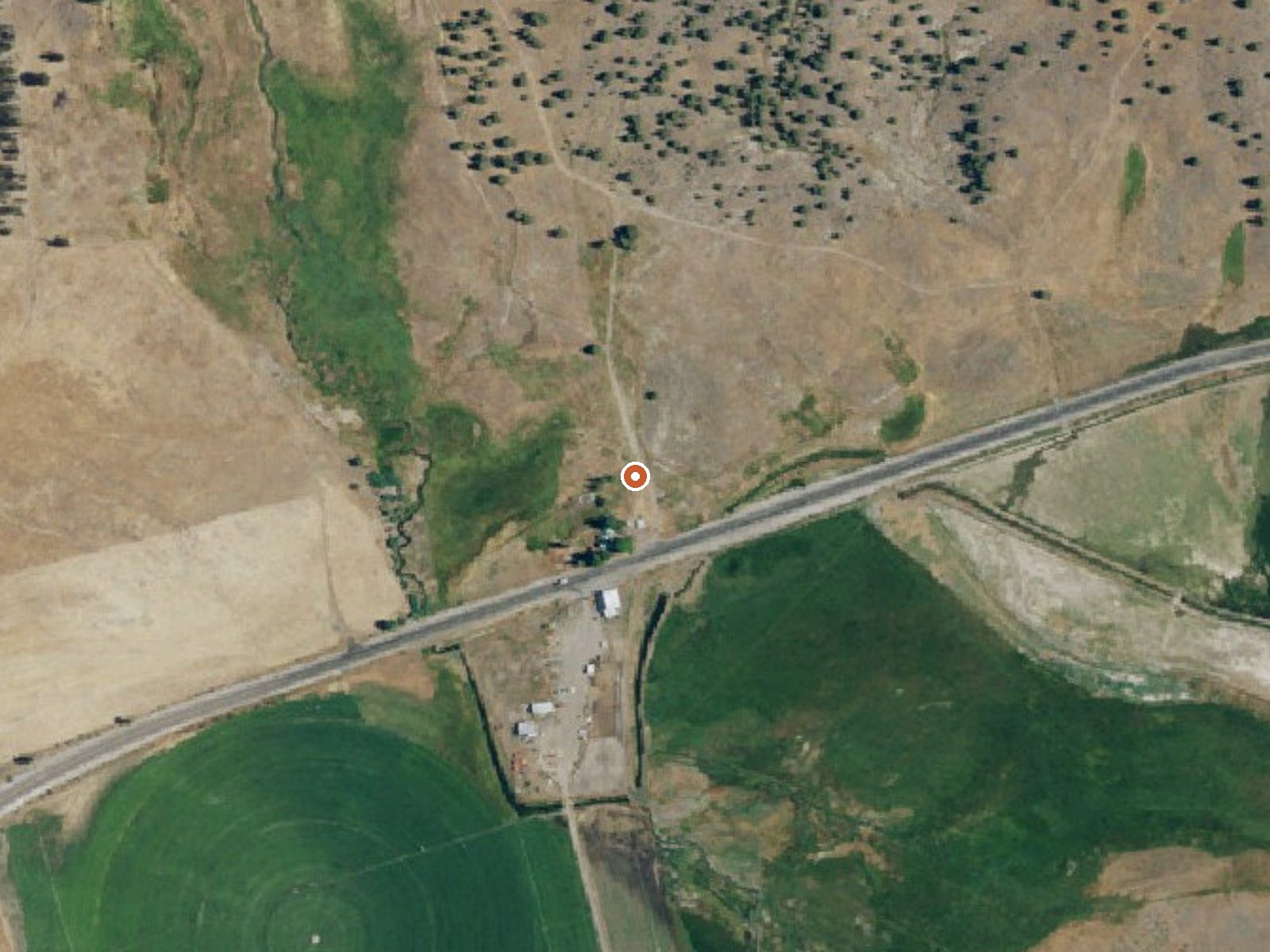 Aerial view of the ground around Essex Springs