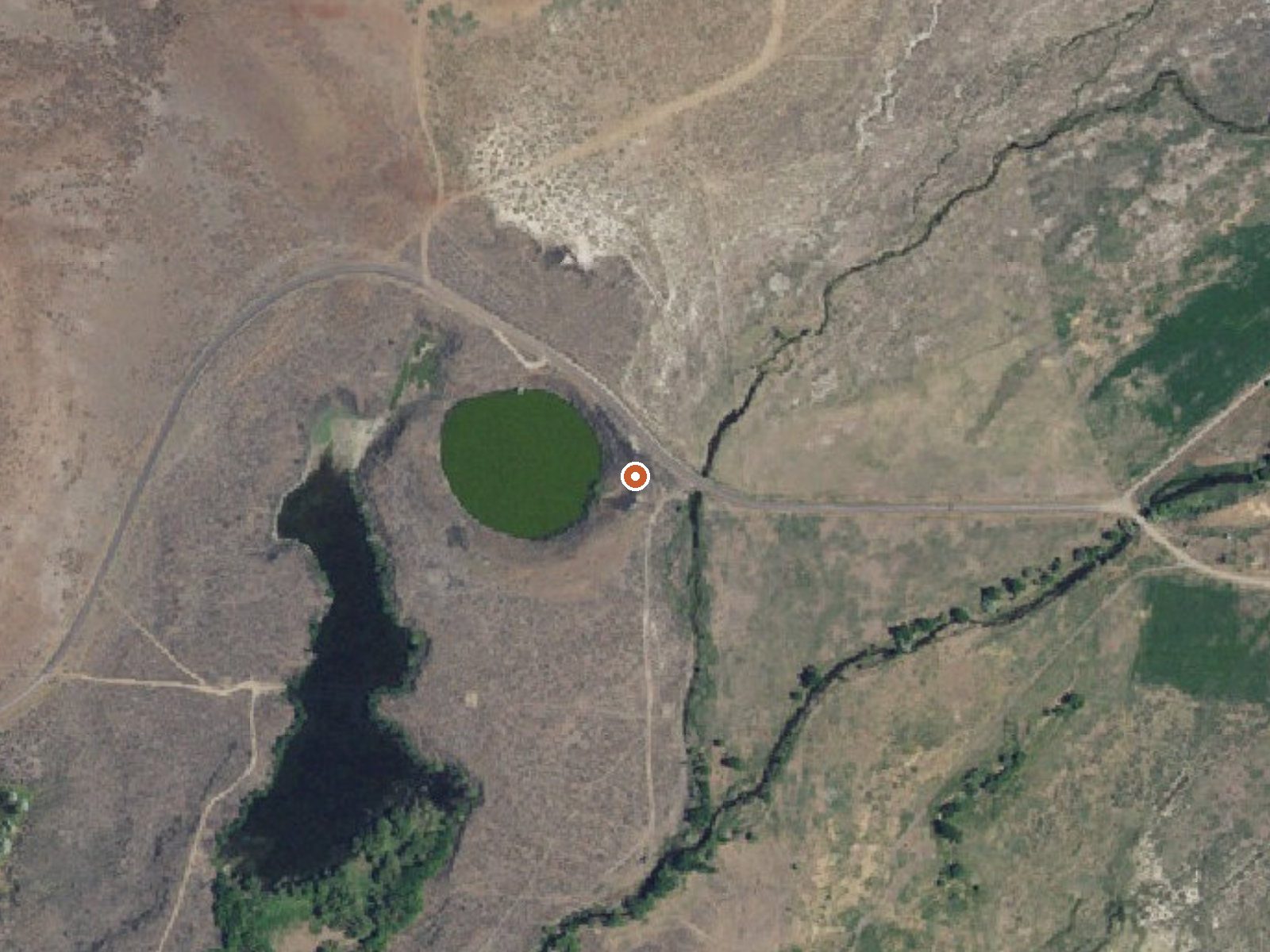 Aerial view of the ground around Hot Sulphur Lake