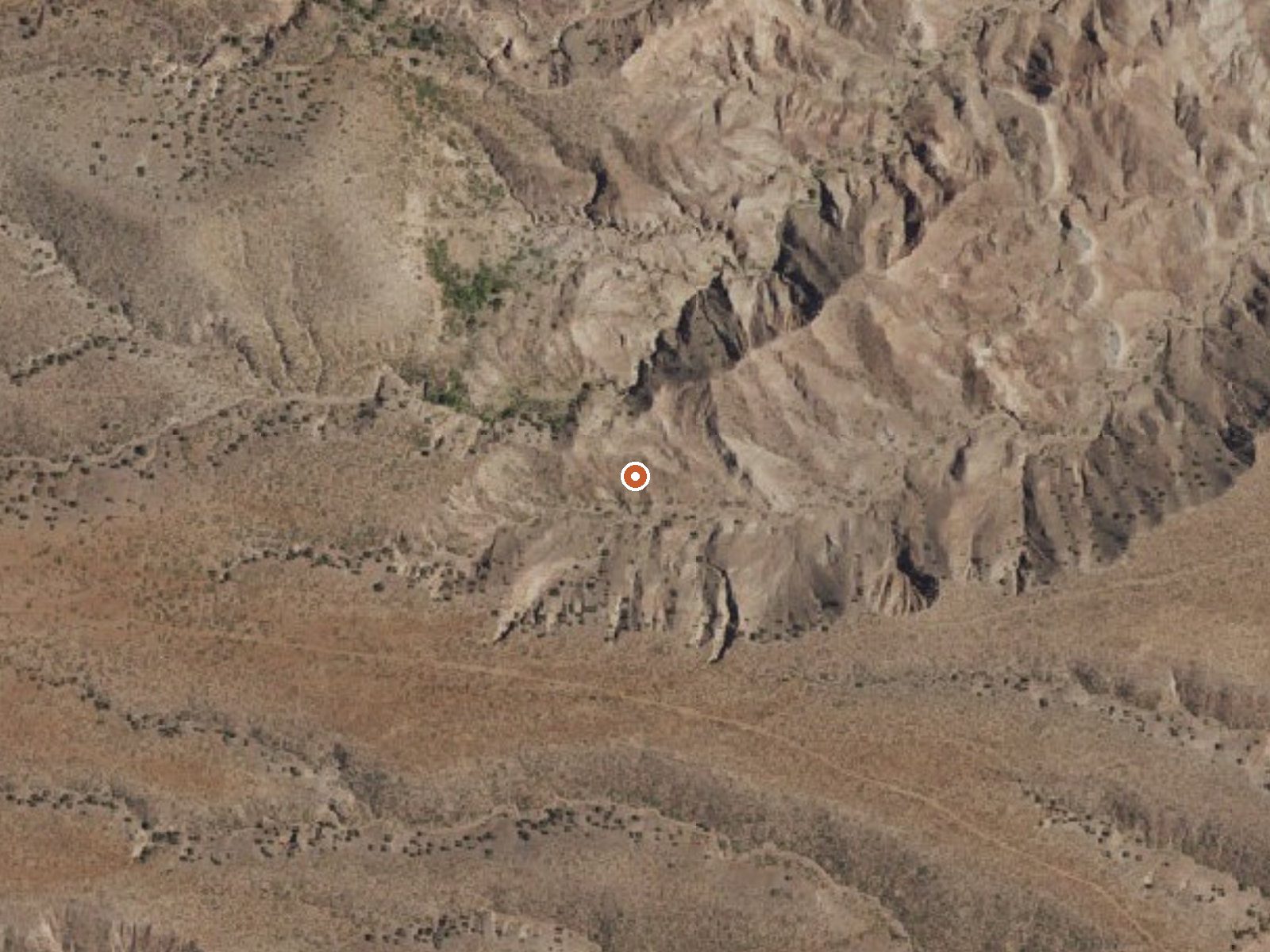 Aerial view of the ground around Ojitos Springs