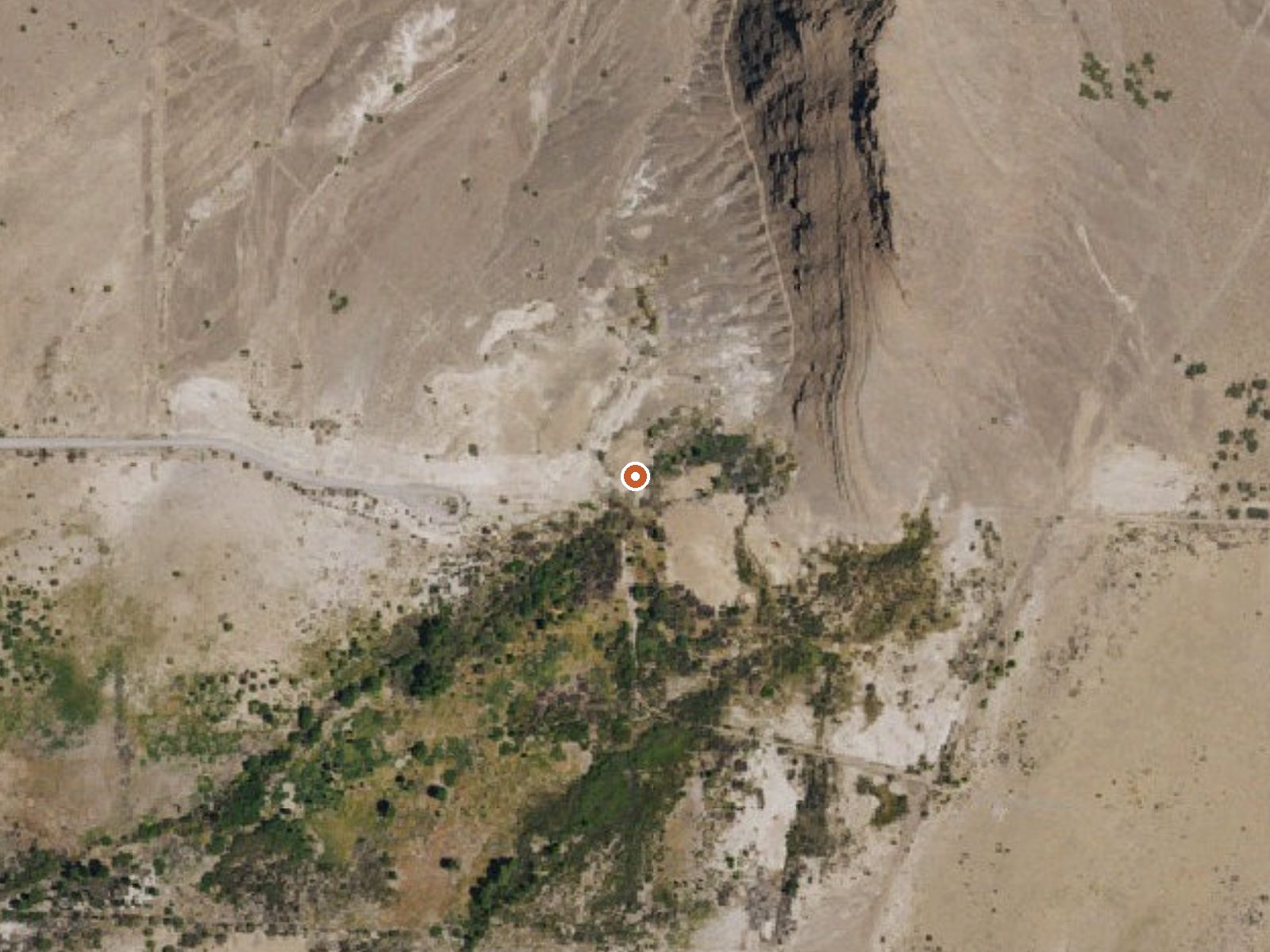 Aerial view of the ground around Point Of Rocks Springs, King Spring