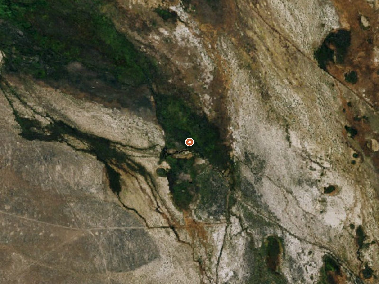 Aerial view of the ground around Springs (Hot)