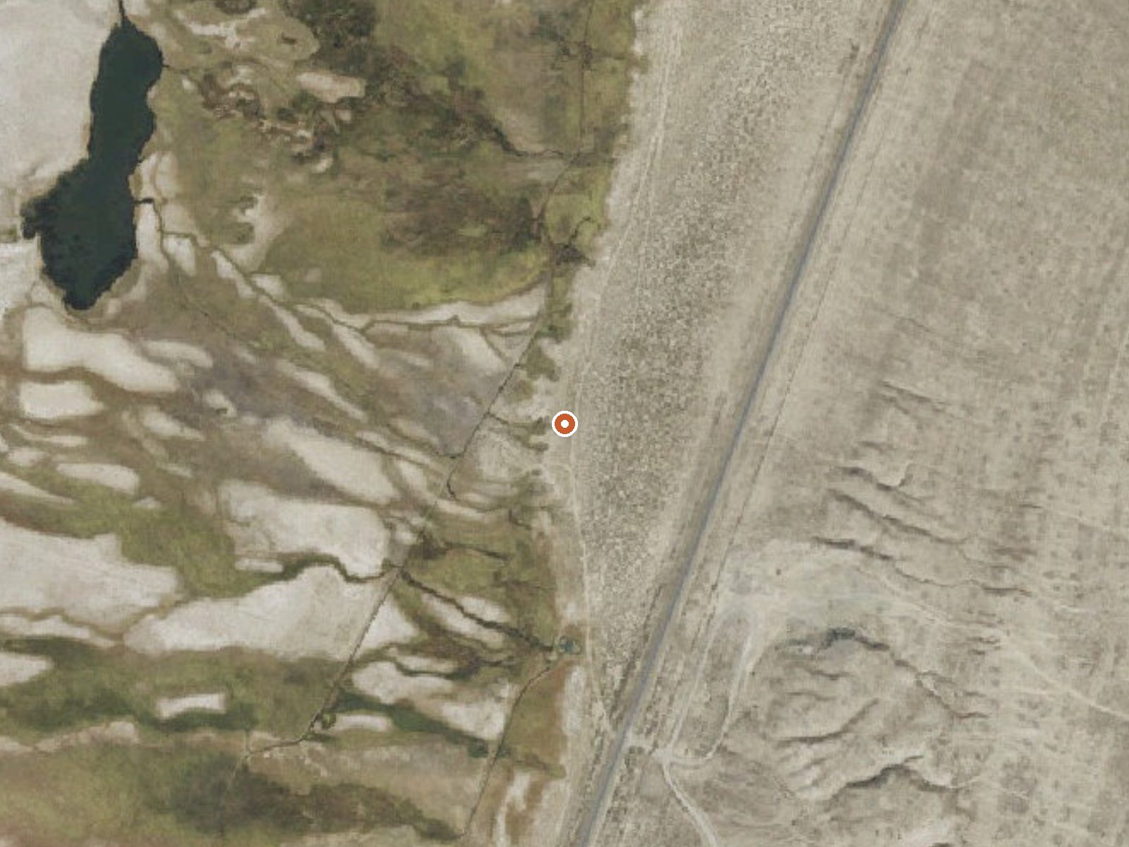 Aerial view of the ground around Deseret Livestock South Spring
