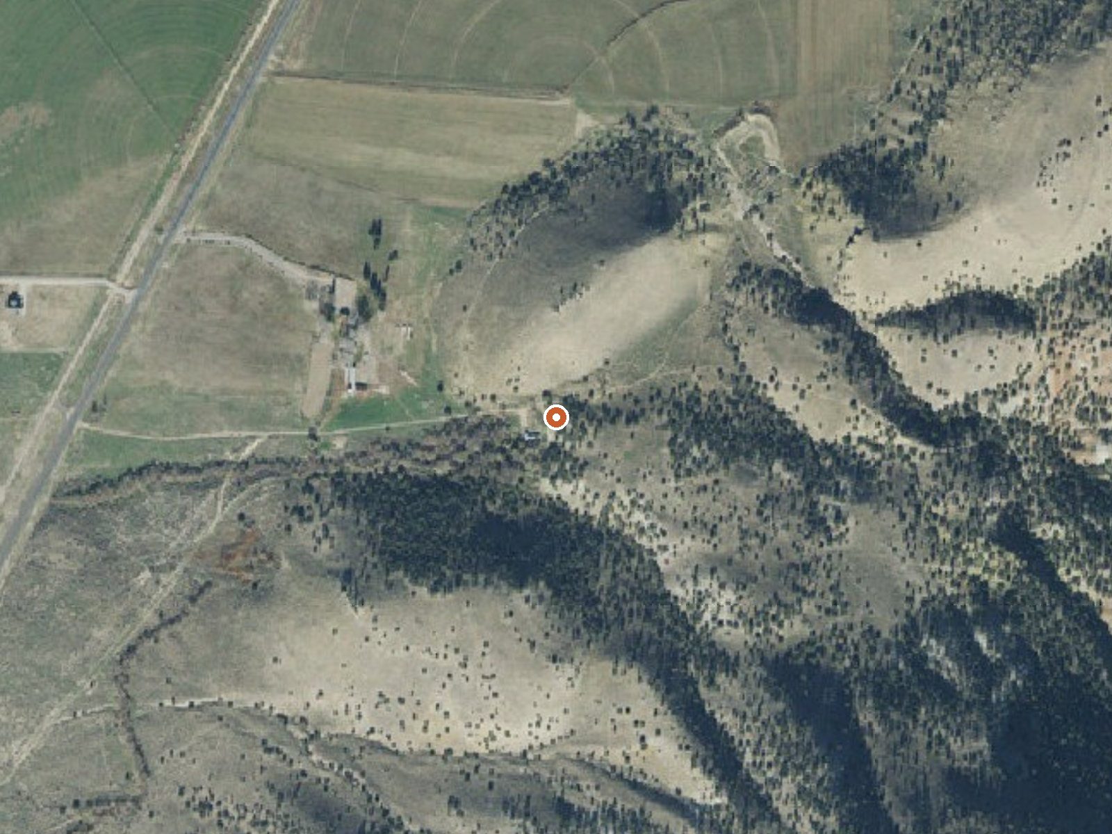 Aerial view of the ground around Sterling (Peacock) Warm Spring